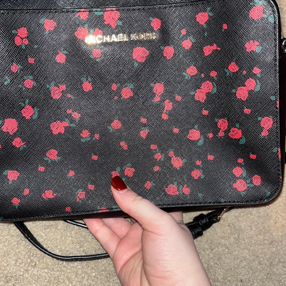 Michael Kors black and gold rose crossbody